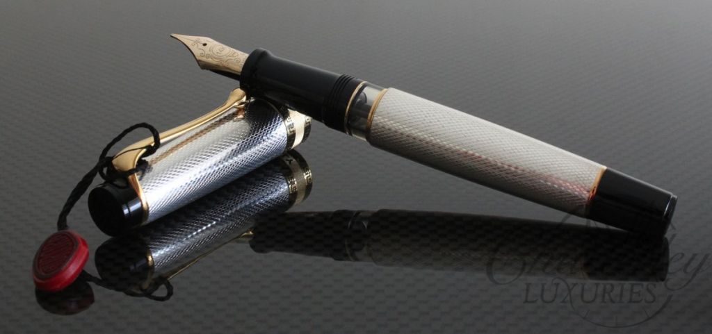 Aurora Solid Silver Fountain Pen Gold Trimmings