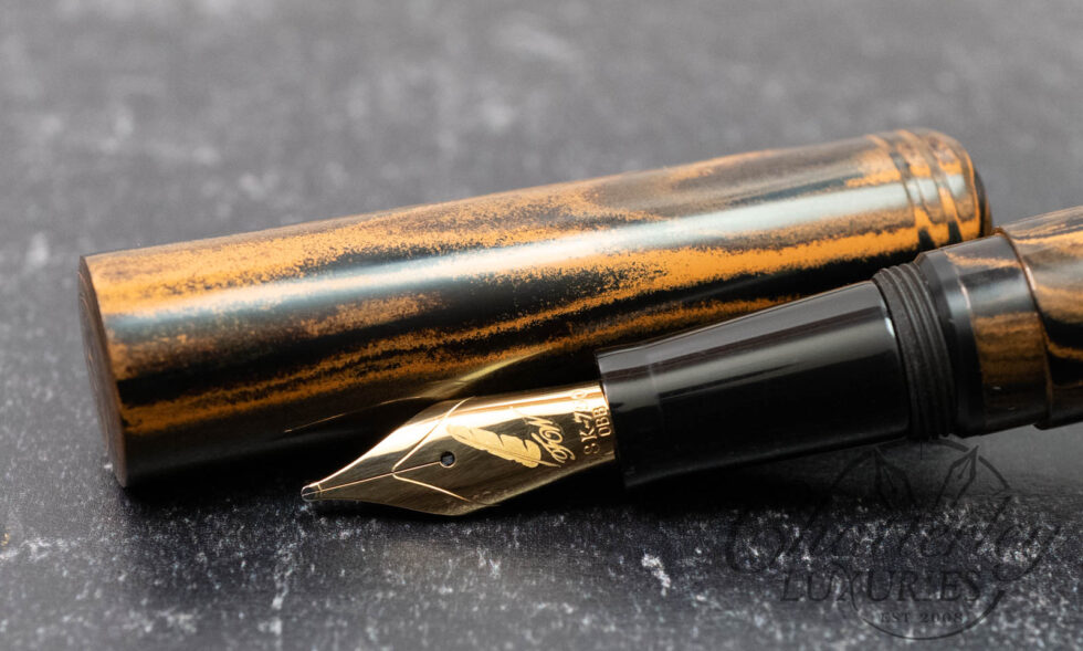 Fine Writing International Tiger with Brass Rollstop Ebonite Fountain Pen