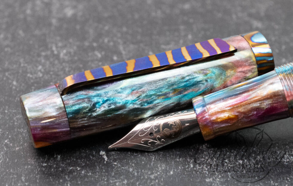 Atelier Lusso Carina 15 Rainbow Resin Fountain Pen with a Striped Timascus Clip